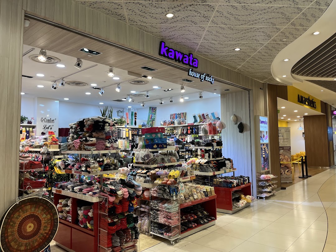 The image shows the entrance of Kawata House of Socks, filled with products.