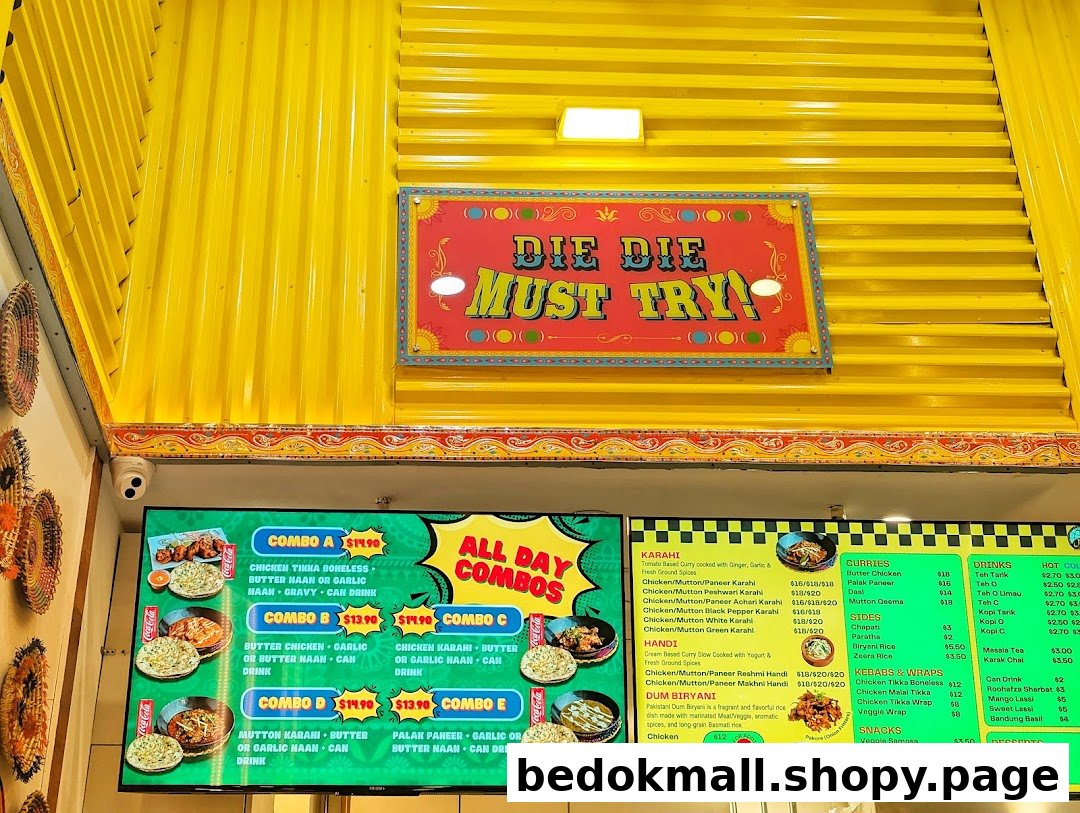Digital menu board displaying food combos, curries, drinks, and prices.