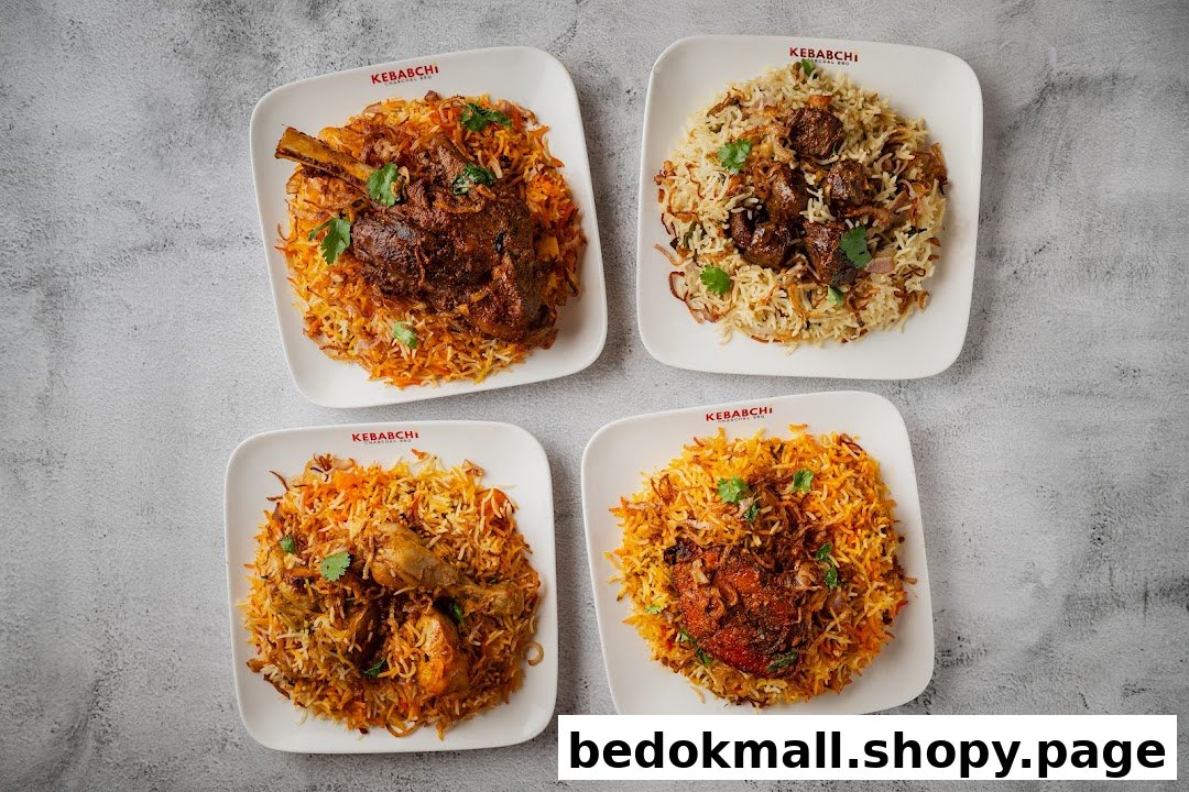 Four plates of biryani with various meats on a grey background.