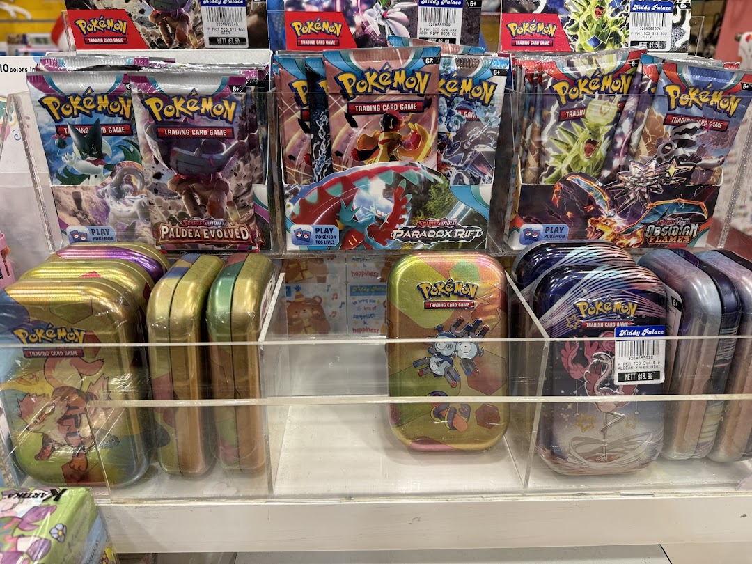 Display of Pokémon Trading Card Game booster packs and tins in a retail store.