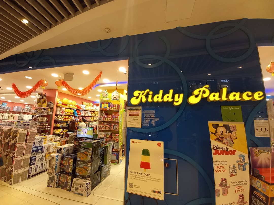 Entrance of Kiddy Palace with toys and promotional signs visible.