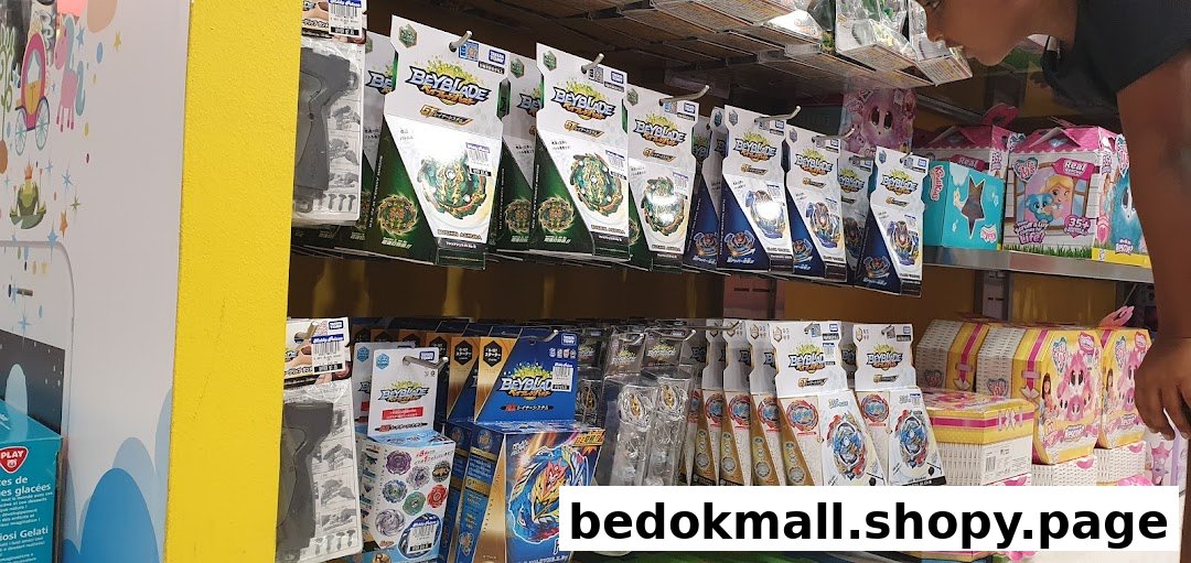 Shelves displaying Beyblade toys and other products inside a Kiddy Palace store.
