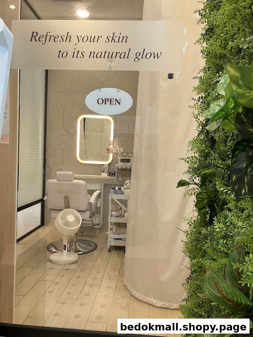 View into a facial shop with a treatment chair and equipment.