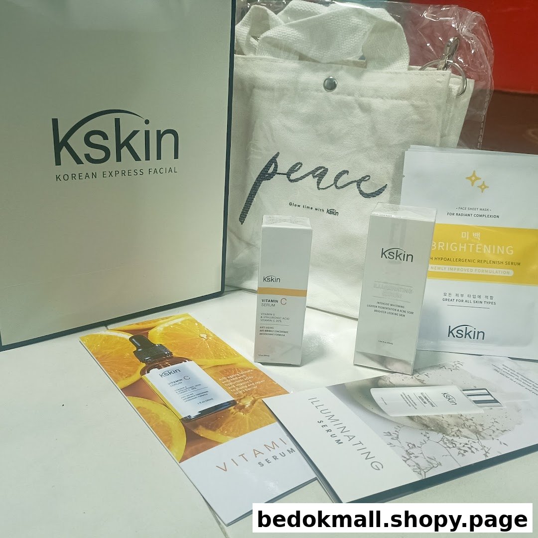 Kskin skincare products, branded bag, and promotional leaflets displayed on a surface.