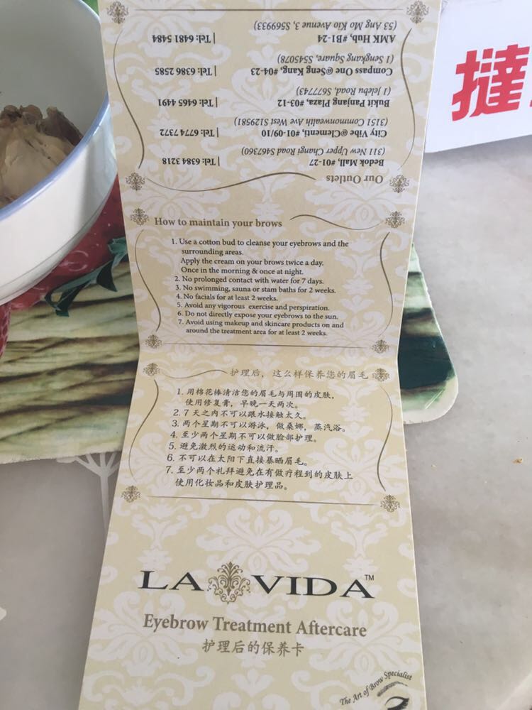 A folded card from La Vida detailing eyebrow treatment aftercare instructions.