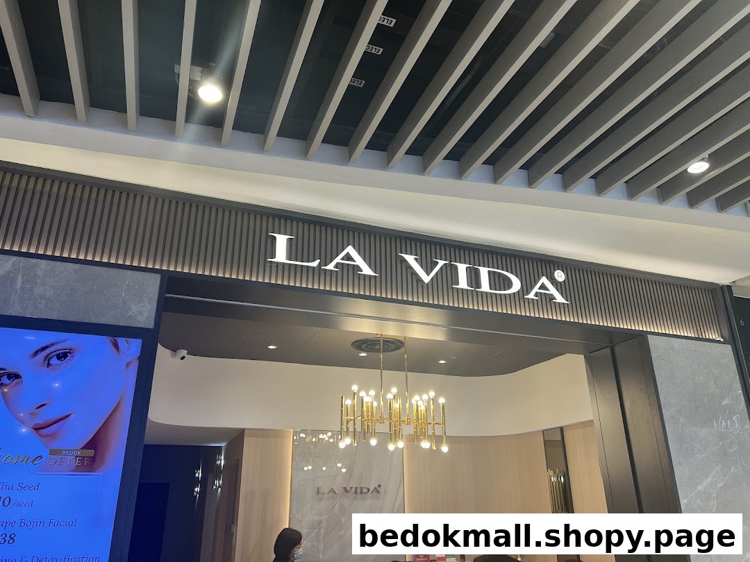 Shop entrance with 'LA VIDA' signage and partial interior view.
