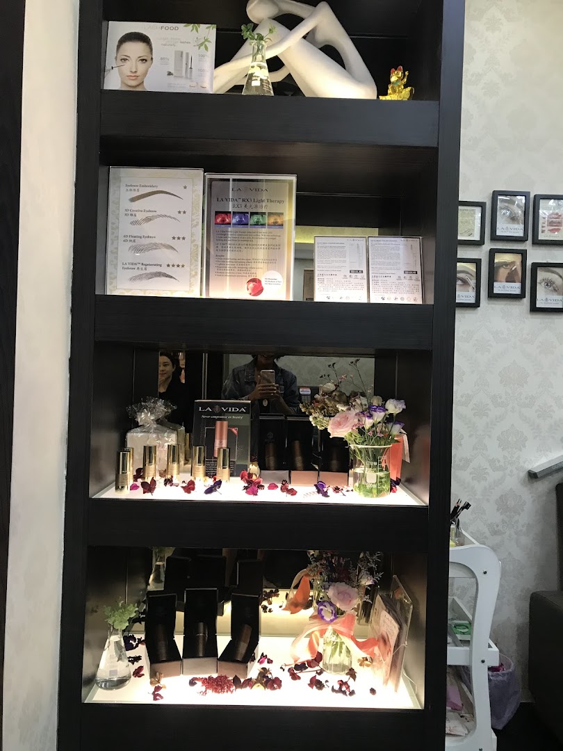 Interior shot of a display shelf with beauty products and decor.