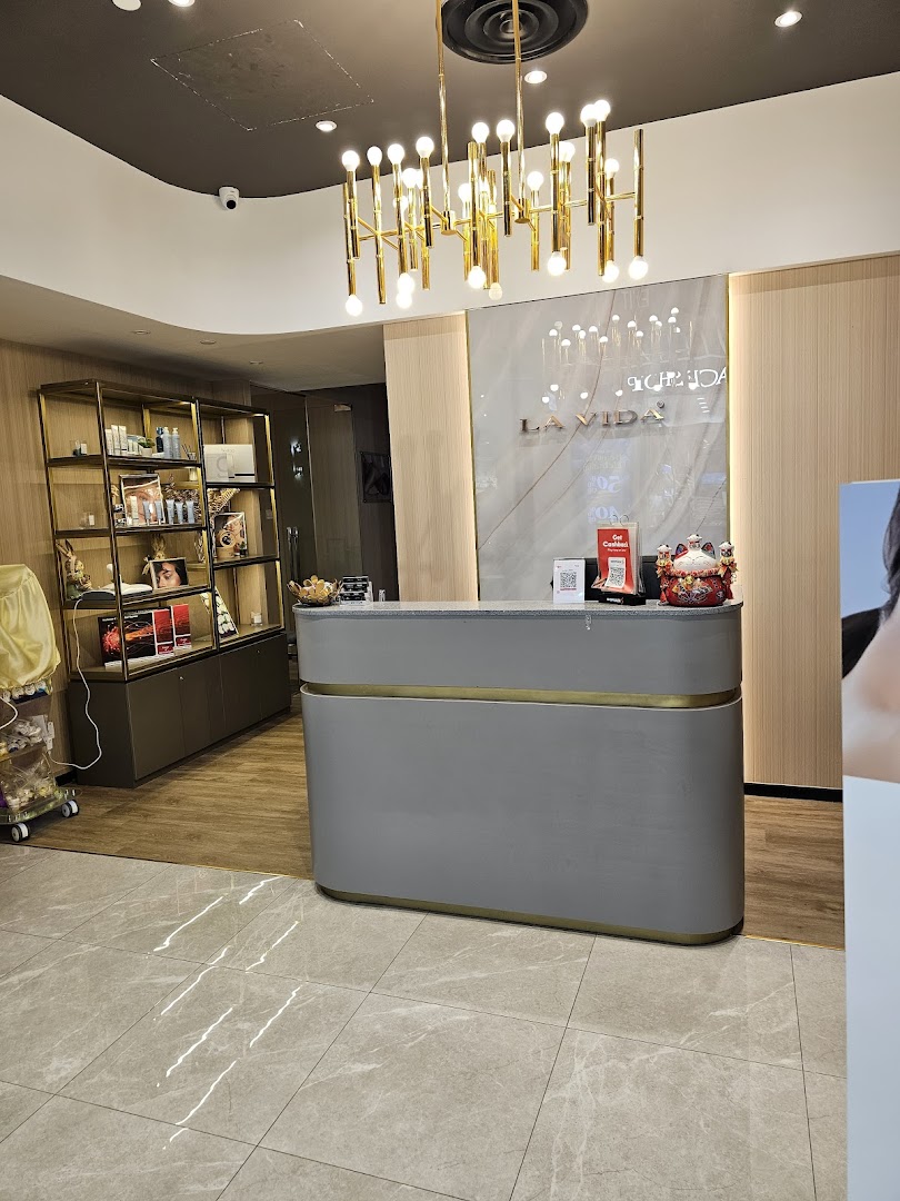 Shop interior showing a modern reception desk and product shelves.