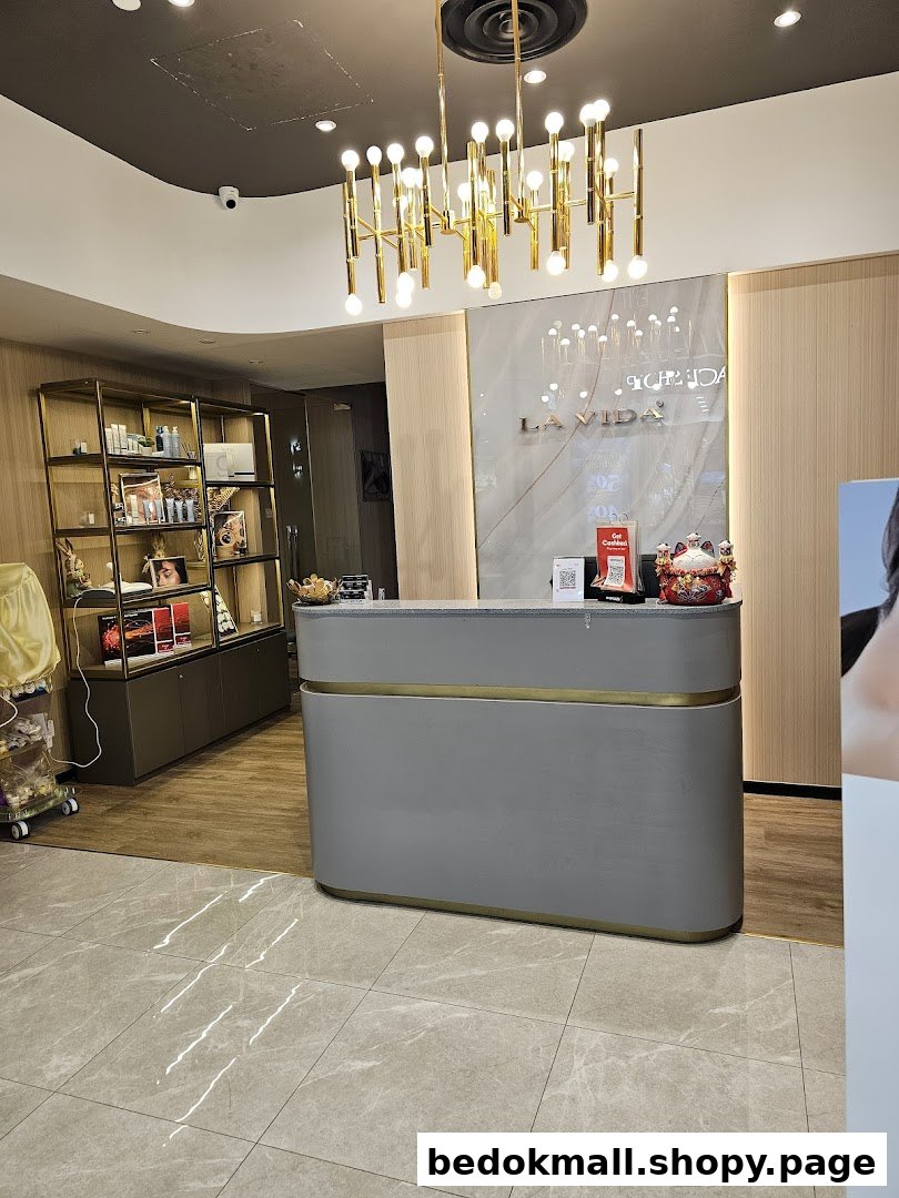 Shop interior showing a modern reception desk and product shelves.