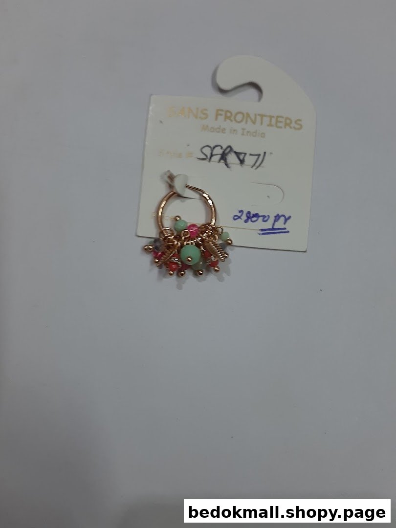 A beaded hoop earring on a product tag with price details.