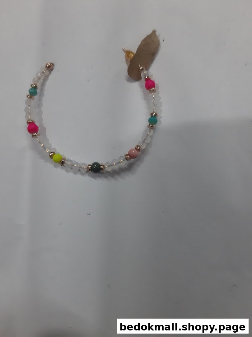 A single beaded hoop earring with colorful beads on a white surface.