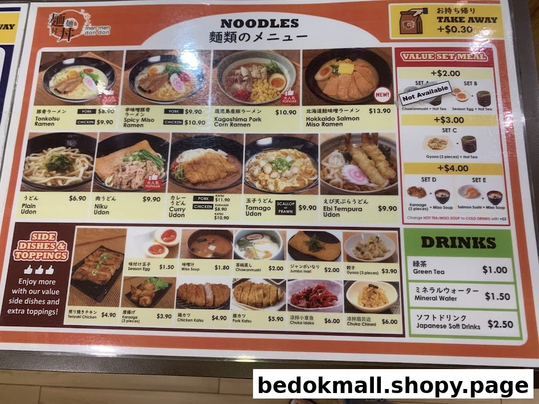 A detailed menu board displaying various noodle dishes, sides, and drinks with prices.