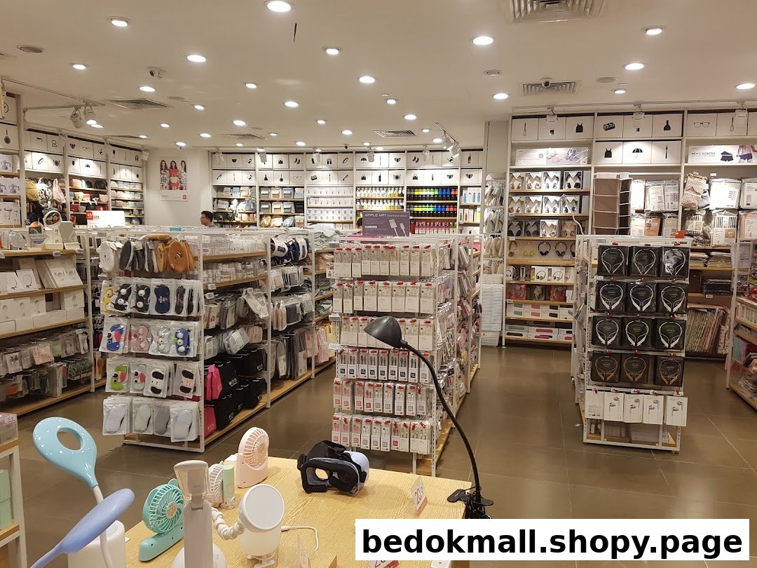 Interior view of a retail store with various products on shelves and displays.