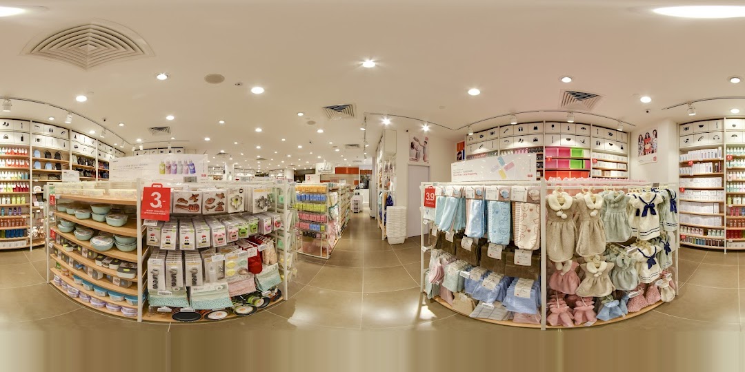 Interior view of a MINISO store displaying various products on shelves.