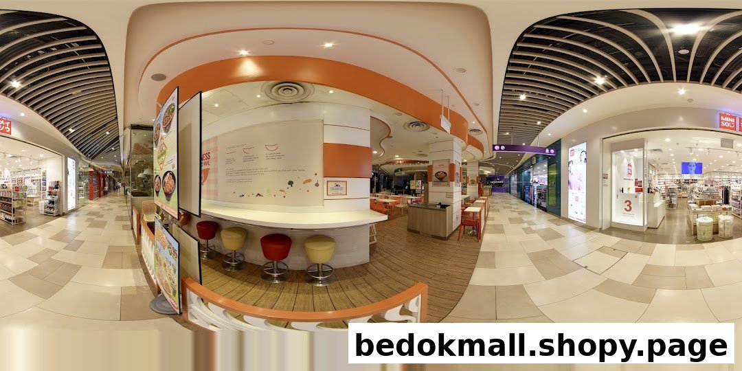 Shopping mall interior with a MINISO store and a food stall area.