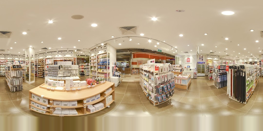 Interior view of a MINISO retail store with various products on display.