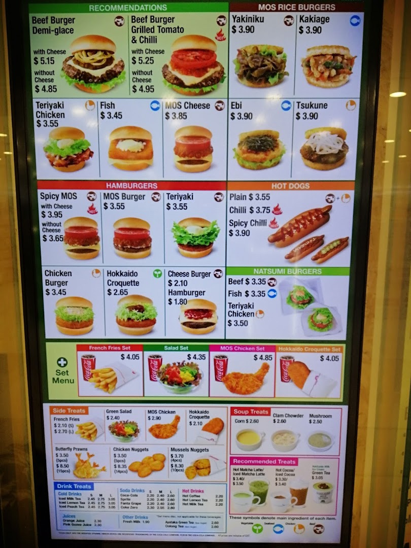 A digital menu board displaying various food items and prices from MOS Burger.