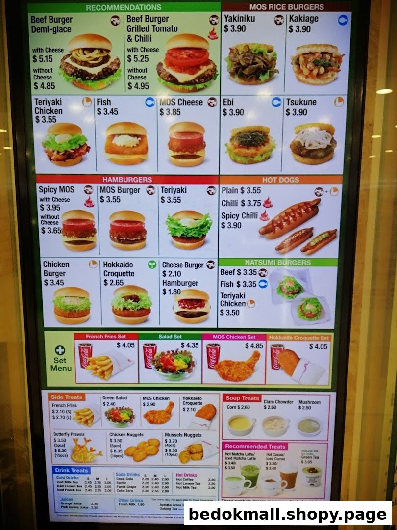 A digital menu board displaying various food items and prices from MOS Burger.