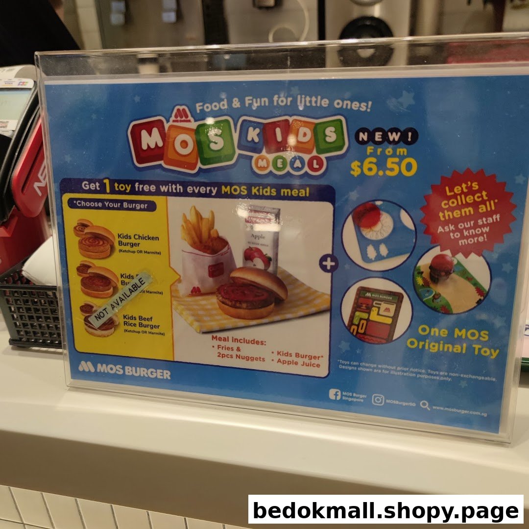A promotional display for a MOS Kids Meal showing food items and a toy.