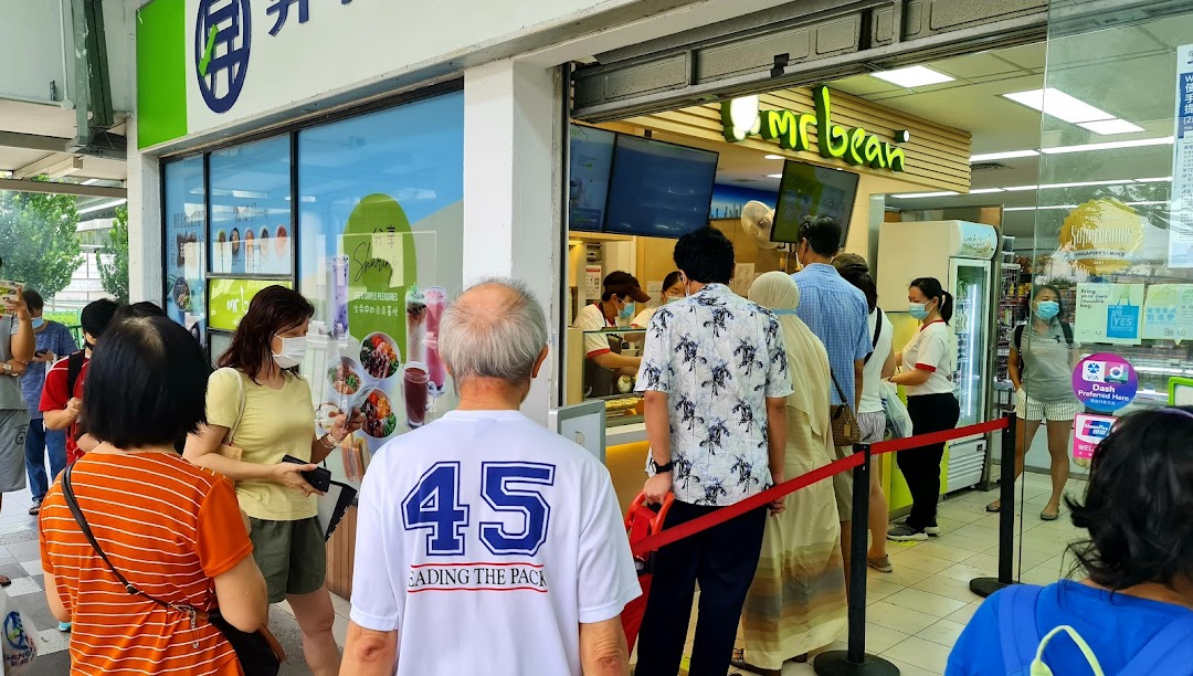 People queueing outside the Mr Bean shop entrance.