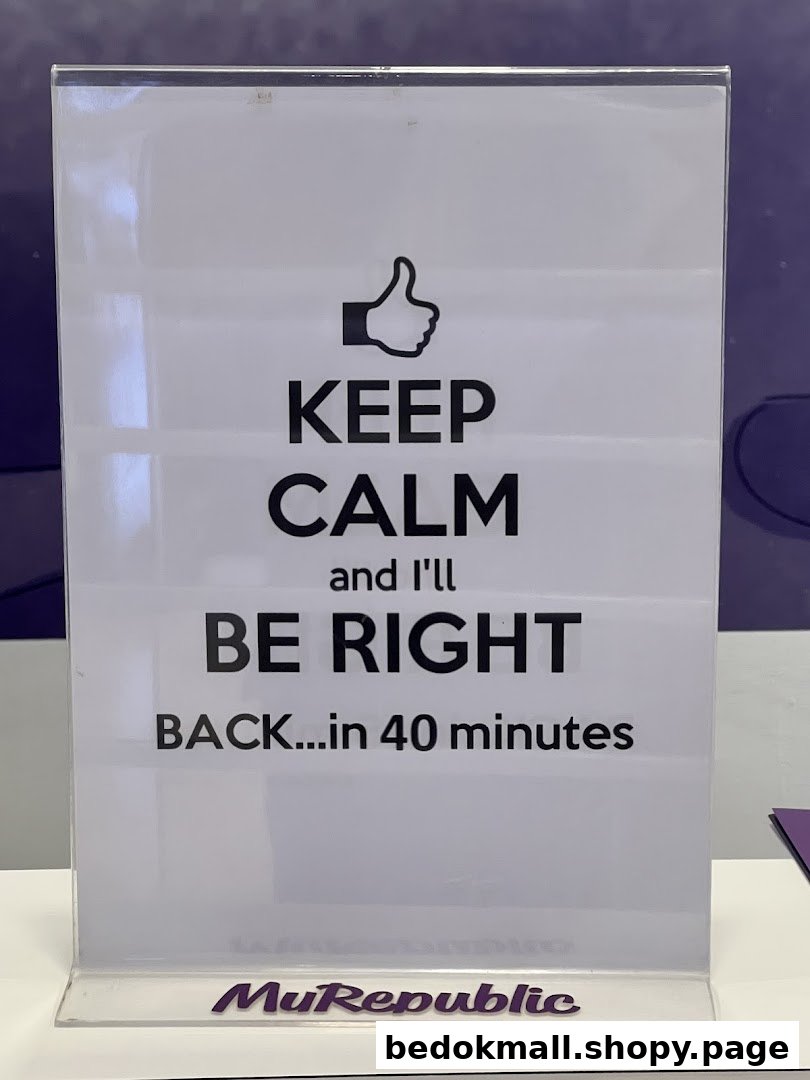 A humorous 'Keep Calm' sign in an acrylic holder with MyRepublic logo.