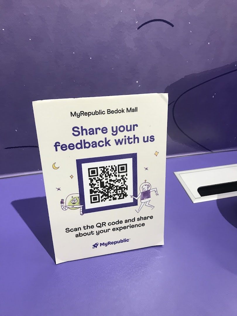 A feedback sign with a QR code for MyRepublic Bedok Mall.