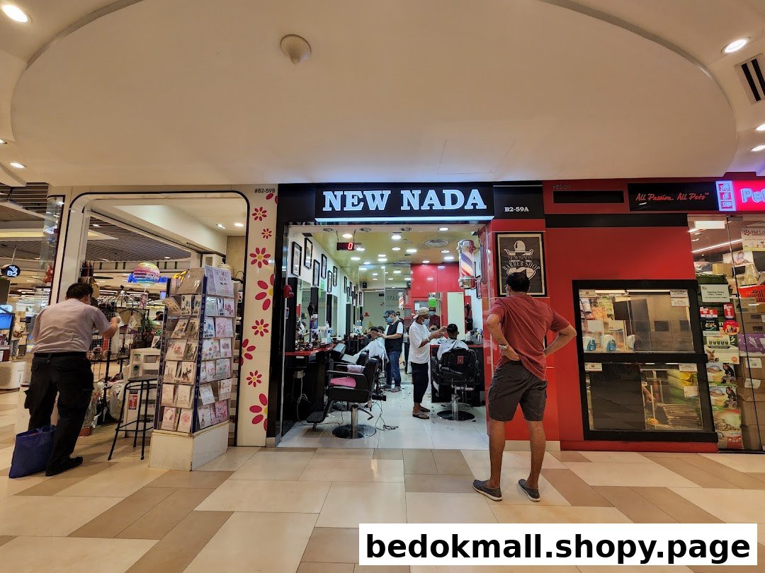 Entrance of a barber shop in a mall with people inside and outside.