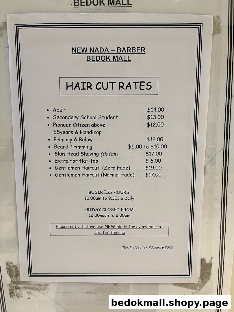 A price list for haircut rates and business hours at New Nada Barber.