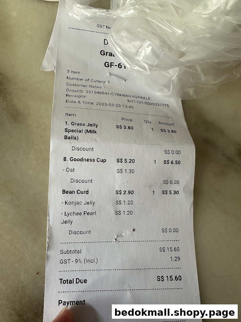A close-up of a retail receipt showing dessert items, prices, and total due.