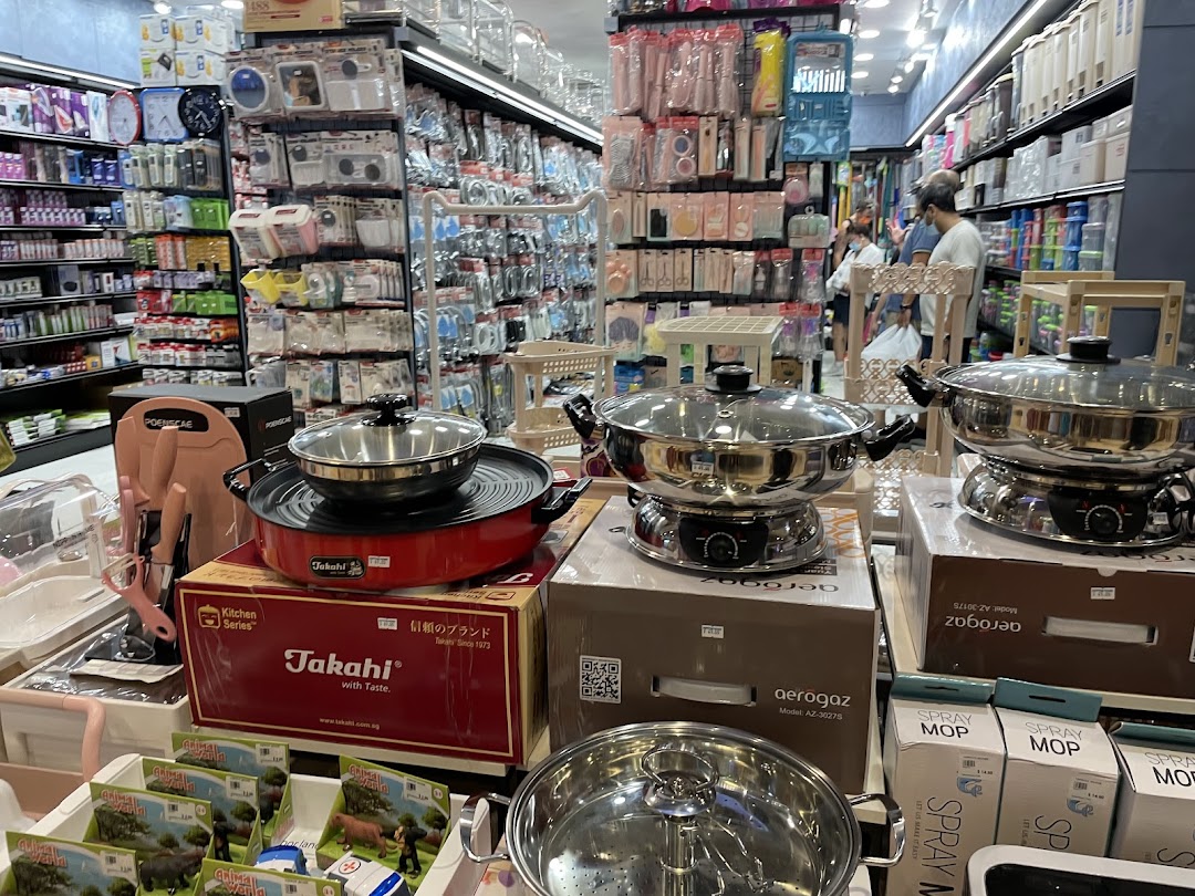 Interior view of a retail shop displaying kitchenware and various household items.