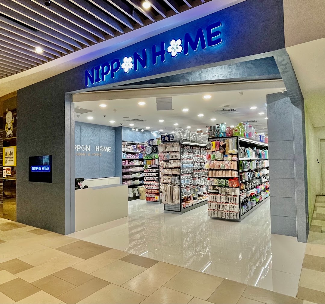 Entrance of Nippon Home shop with products visible inside.