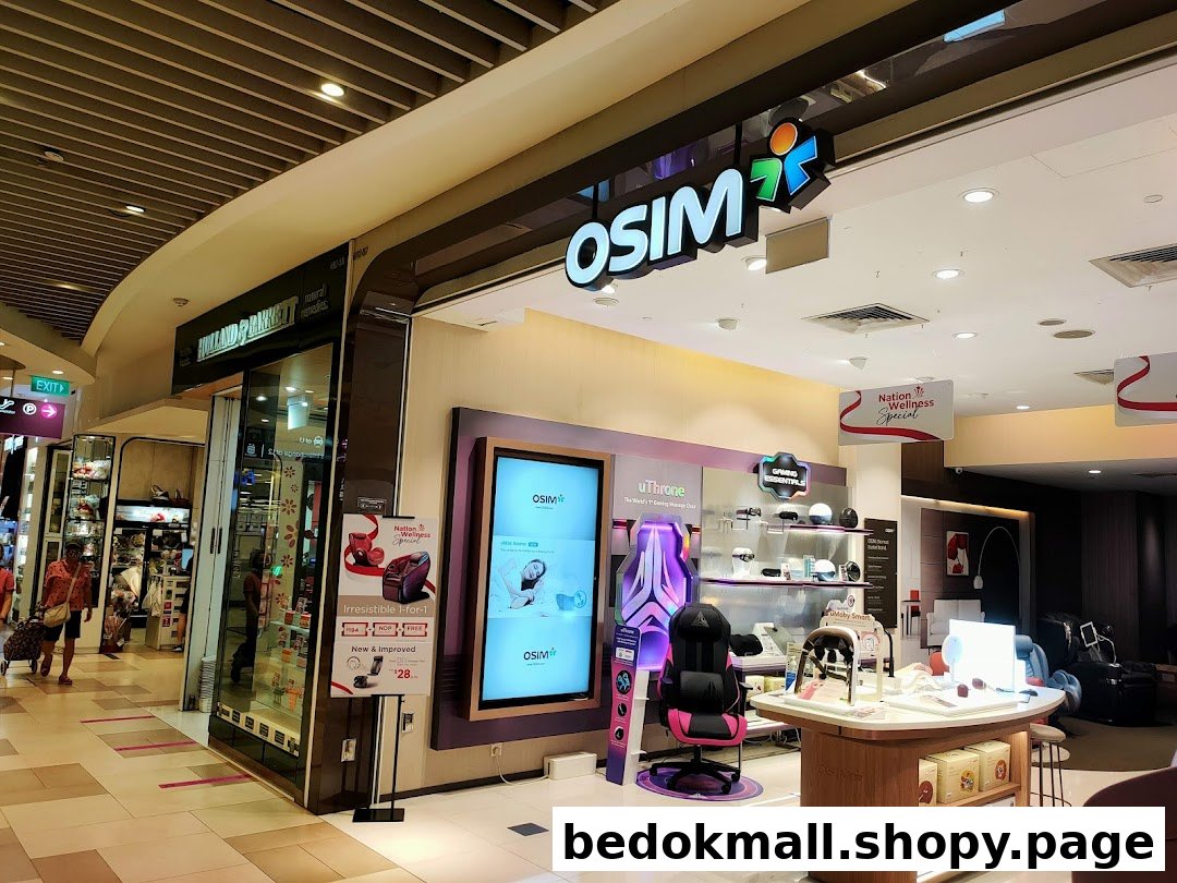 OSIM shop entrance with products displayed and adjacent shop in a mall.
