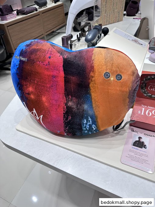 Heart-shaped product on a display table inside a retail shop.