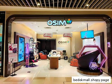 Entrance of an OSIM store displaying massage chairs and products inside.
