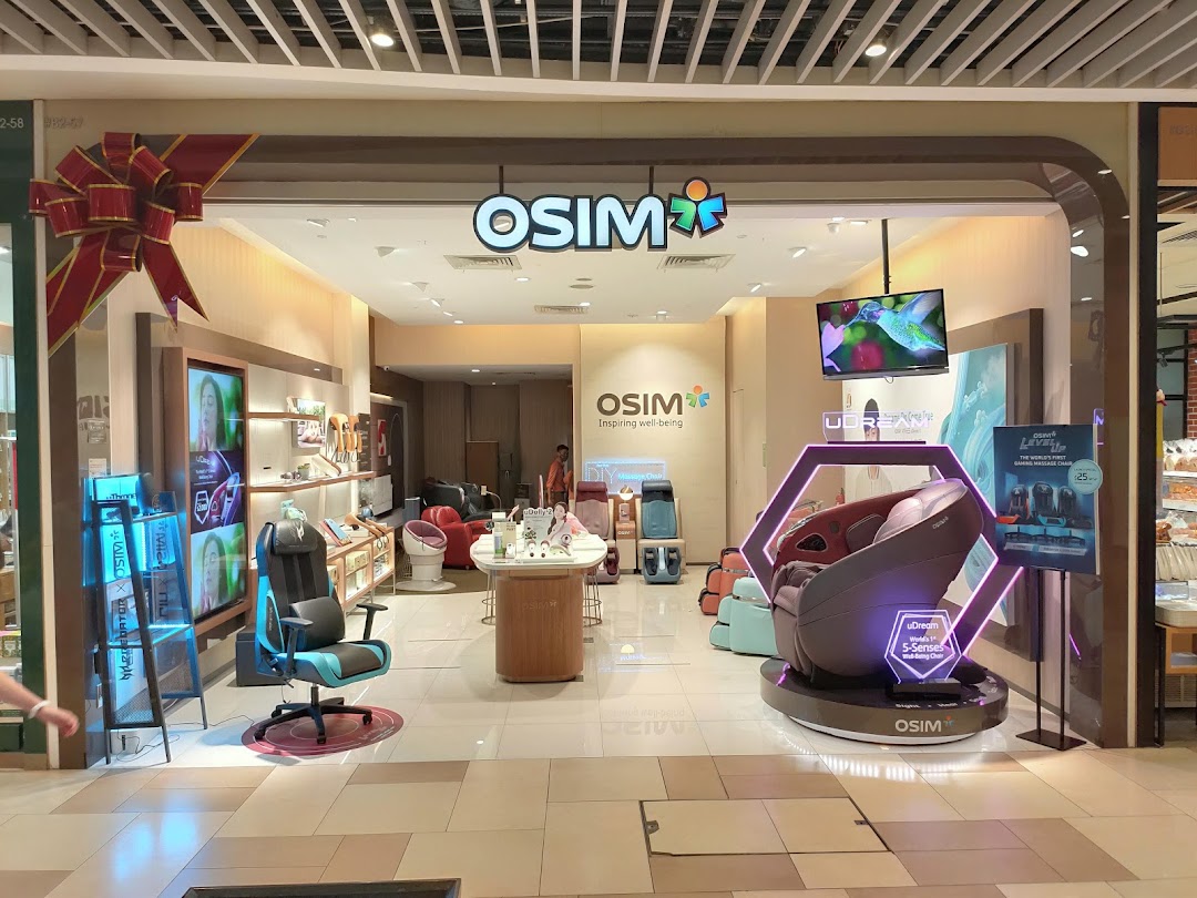 OSIM shop front displaying massage chairs and products.