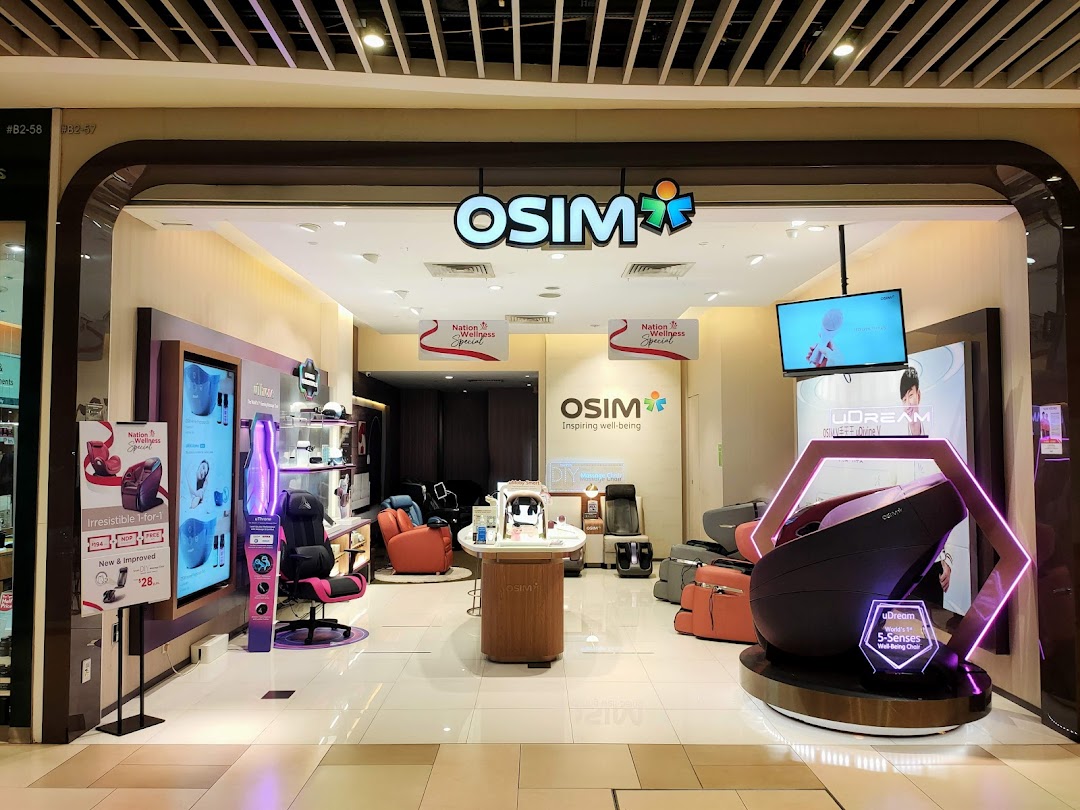 The entrance of an OSIM store showcasing massage chairs and wellness products.