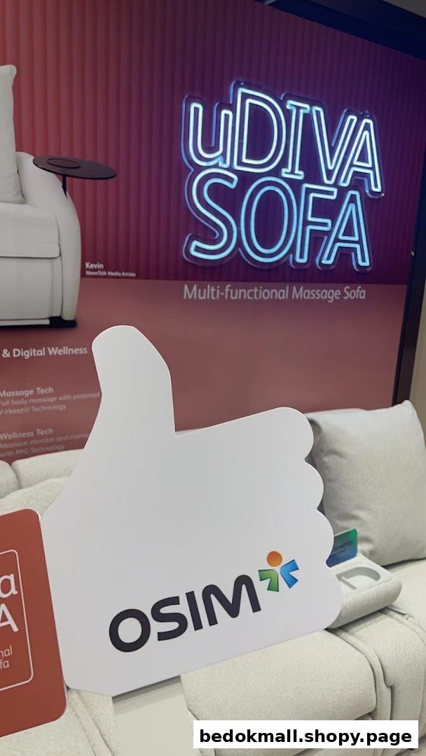 White massage sofa display with OSIM branding and a neon sign.