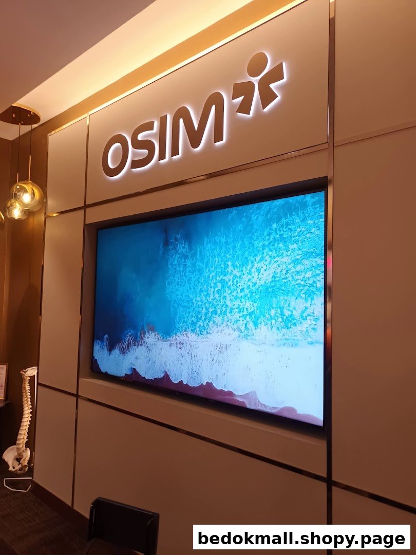 Interior view of OSIM shop with logo and large screen display.