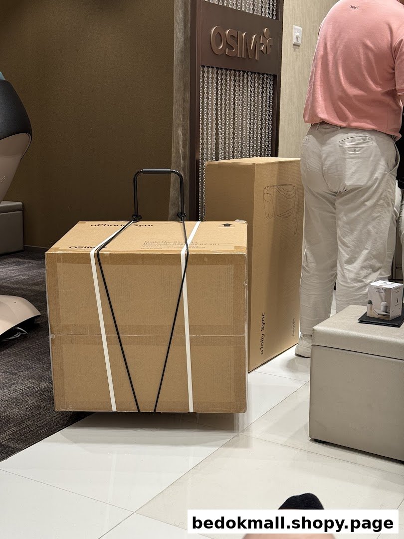 Large boxes and a person inside an OSIM shop.