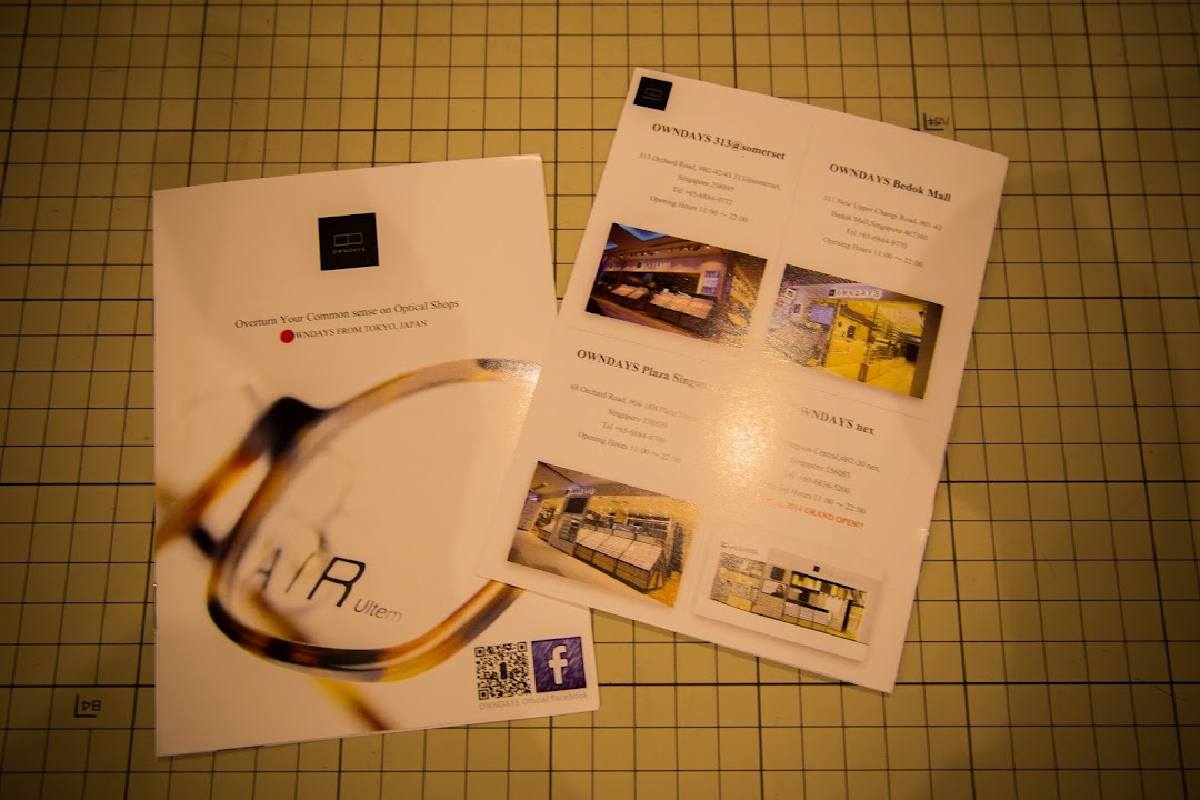 Two OWNDAYS optical shop brochures with store information and product images.