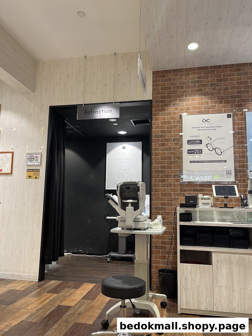 Shop interior showing an eye refraction room and optical equipment.