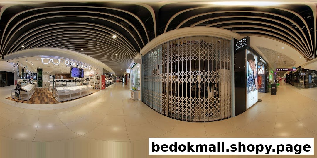 Front of OWNDAYS shop with display cases in a mall corridor.
