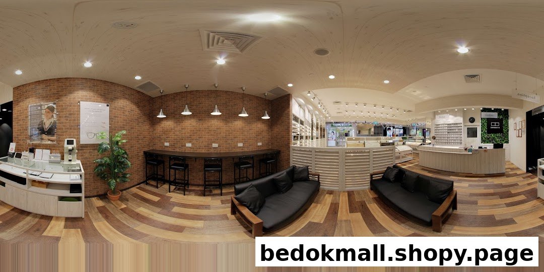 Panoramic view of a modern eyeglasses shop interior with displays, reception, and seating.