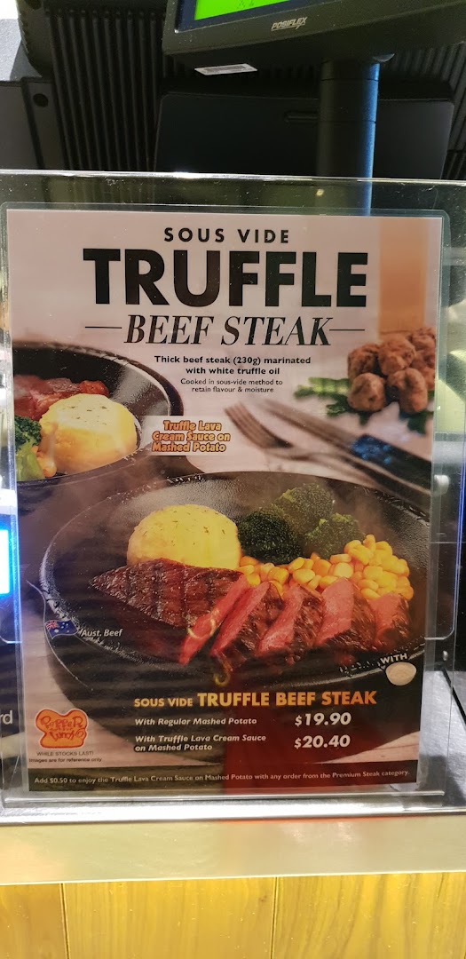 A menu display for sous vide truffle beef steak with prices.