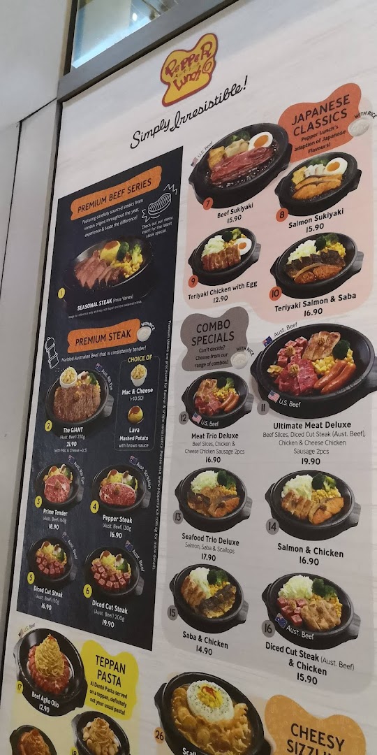 A large display menu for Pepper Lunch showing various food items and prices.