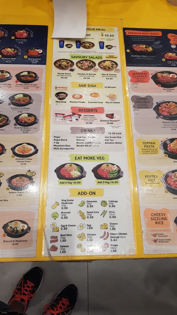 A detailed menu displaying various food and drink options with prices.