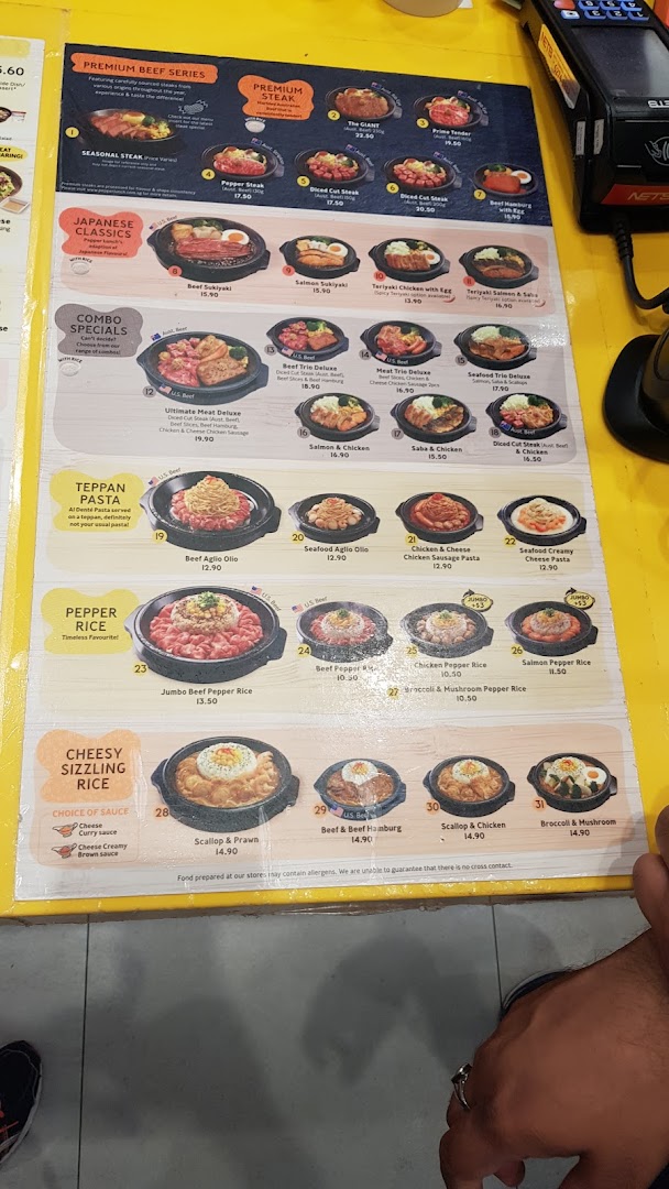 A detailed food menu board with various dishes and prices.