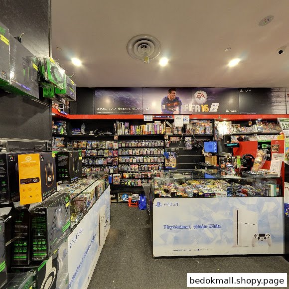Interior view of a video game store with shelves of games and display cases.