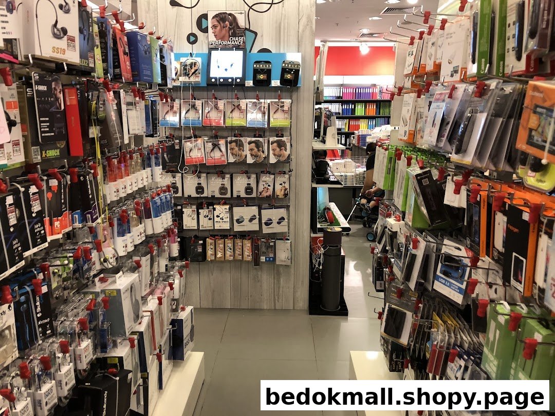 Interior view of a shop aisle displaying numerous packaged electronics accessories.