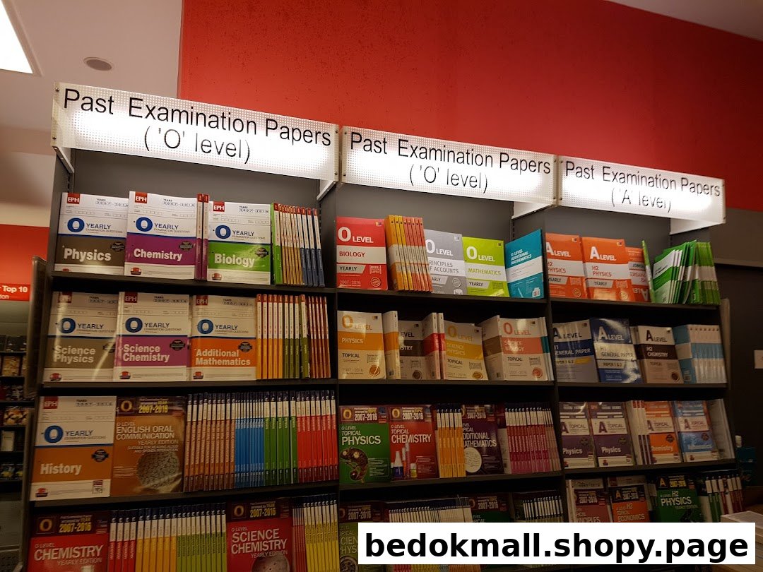 Shelves filled with past examination papers in a bookstore.